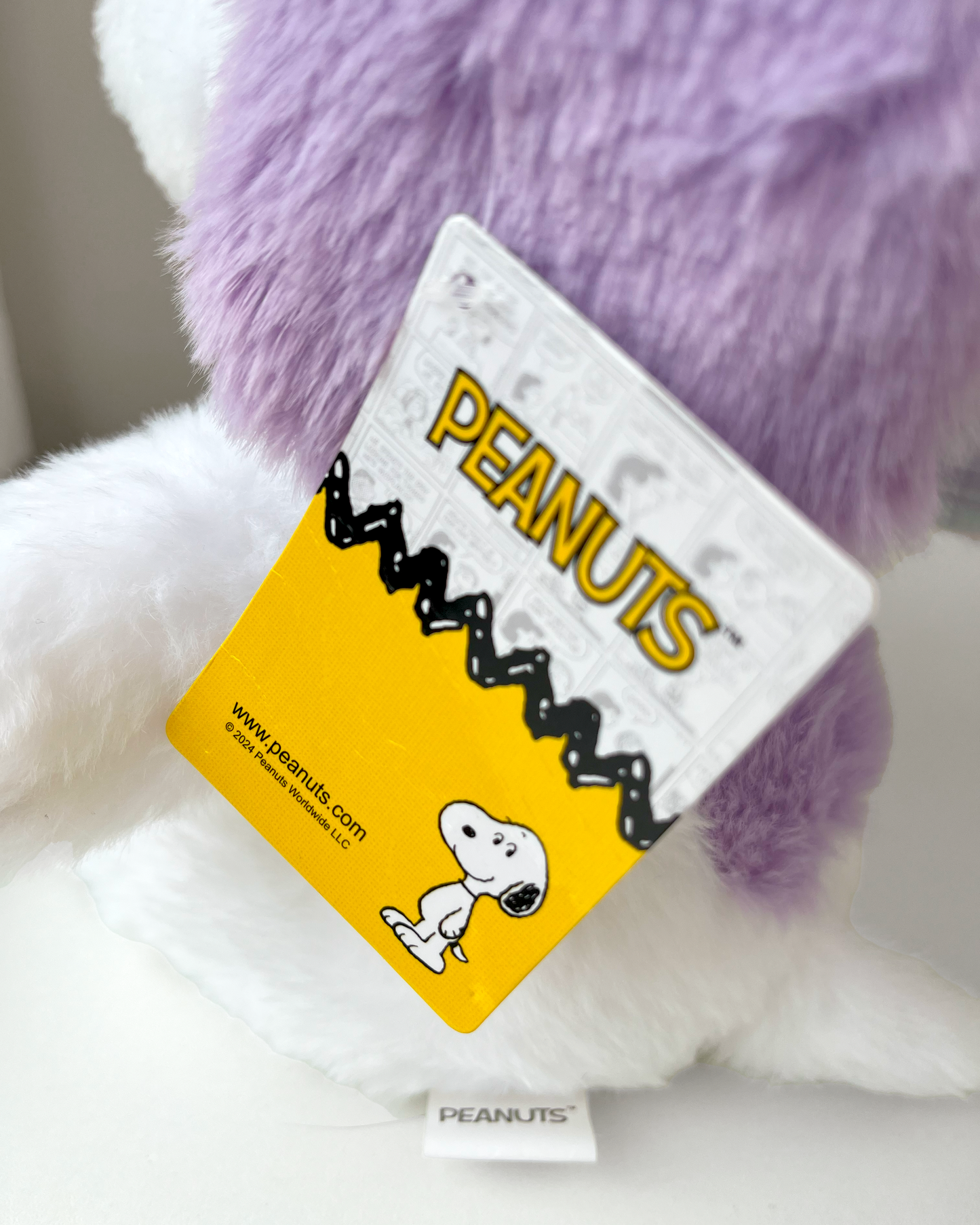 Snoopy Lila Peluche 🐾 © Peanuts