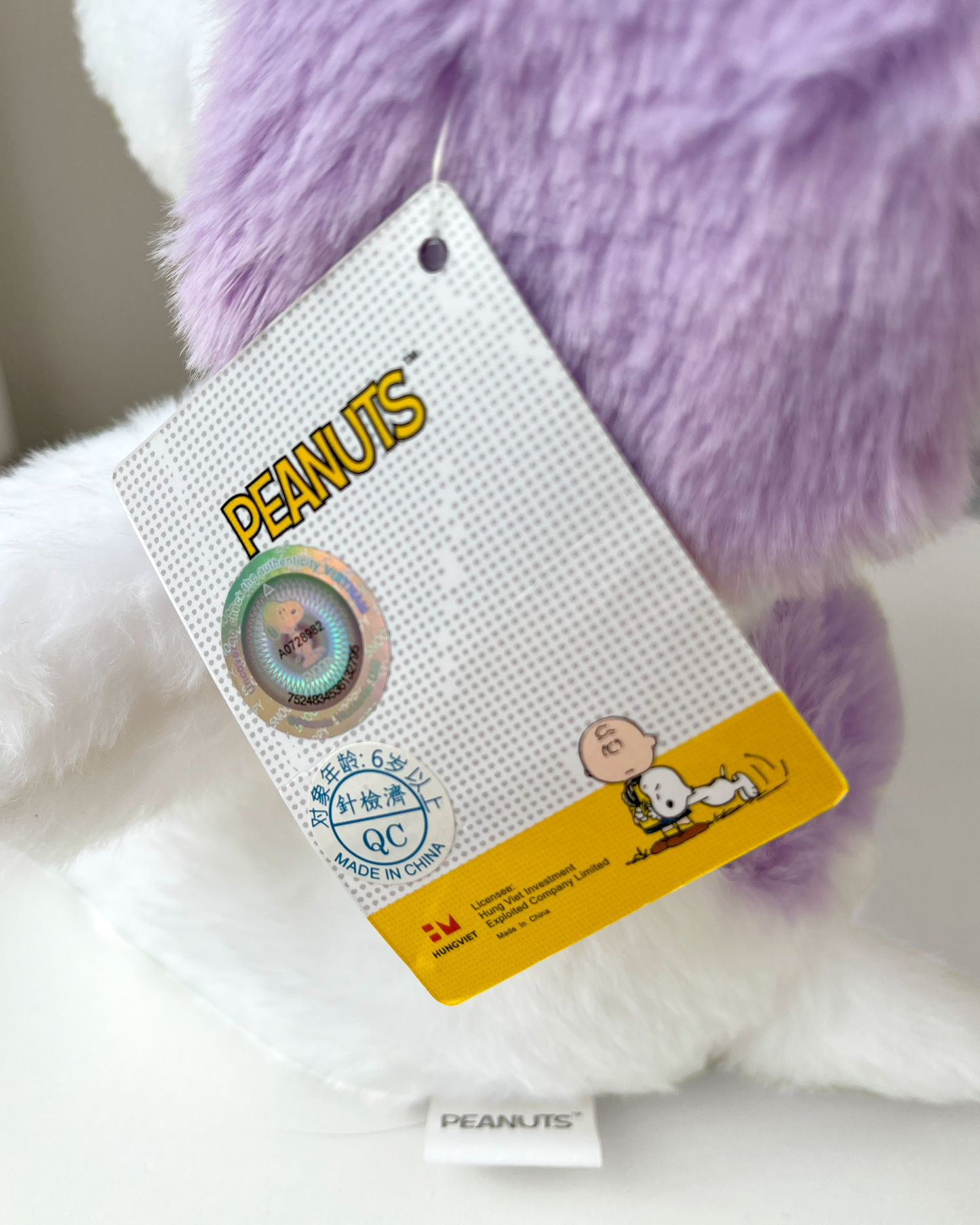 Snoopy Lila Peluche 🐾 © Peanuts